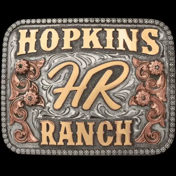 Make a bold statement, like any true cowboy with the Kingman Belt Buckle. The large Jeweler's Bronze lettering is sure to stand out alongside the other beautiful elements of this absolute Ranch Belt Buckle!
